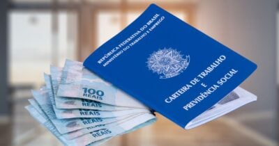 Escritório, notas de cem reais e carteira de trabalho (Fotos: Canva)