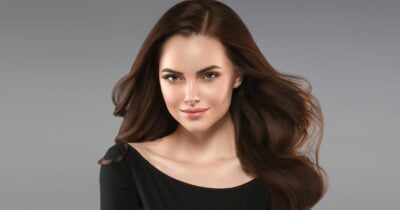 Mulher com o cabelo hidratado (Foto: Canva)