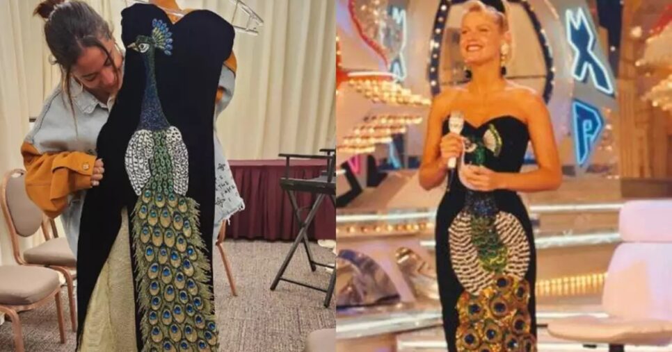 O famigerado vestido preto de pavão roxo que deixou o rei debaixo do banho após abraço (Foto: Reprodução/ Internet)