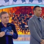 Gugu realiza sonho de gari cantor em seu programa. (Foto: Reprodução/TV Record)