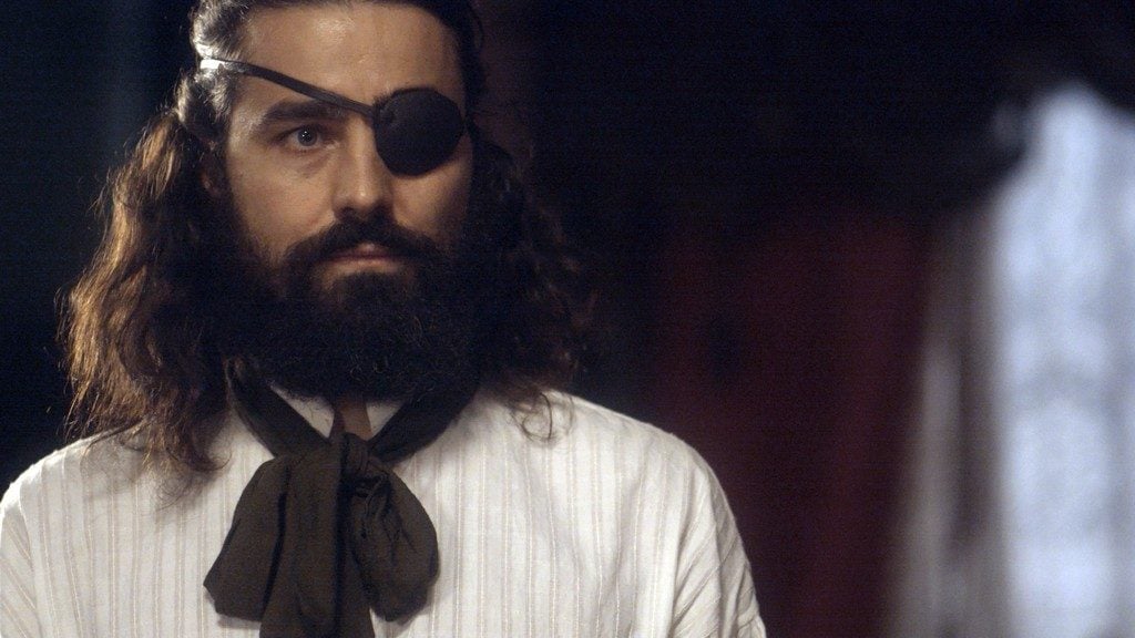 Ferdinando em cena da novela de Novo Mundo com um tapa olho
