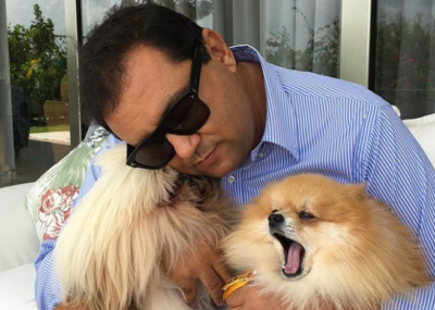 Geraldo Luís e seus cachorros em foto (Foto: Reprodução)