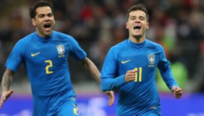 Os jogadores Daniel Alvs e Philippe Coutinho no amistoso Rússia x Brasil
(Foto: Lucas Figueiredo/CBF)