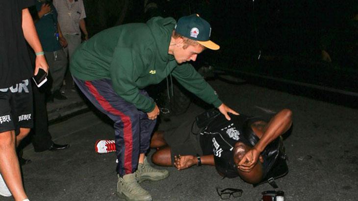 Justin Bieber socorre fotógrafo (Foto: Reprodução)