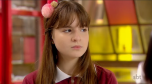 Poliana (Sophia Valverde) em cena na novela As Aventuras de Poliana, trama infantil do SBT. (Foto: Reprodução)