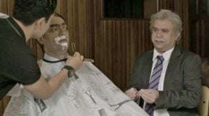 O presidente Jair Bolsonaro da Globo na barbearia (Foto: Reprodução)