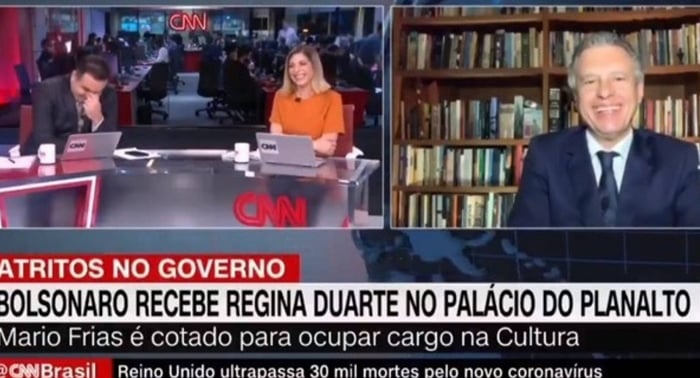 Reinaldo Gottino, Daniela Lima e Fernando Molica caem na risada após entrevista de Mario Frias (Foto: Reprodução/CNN Brasil)