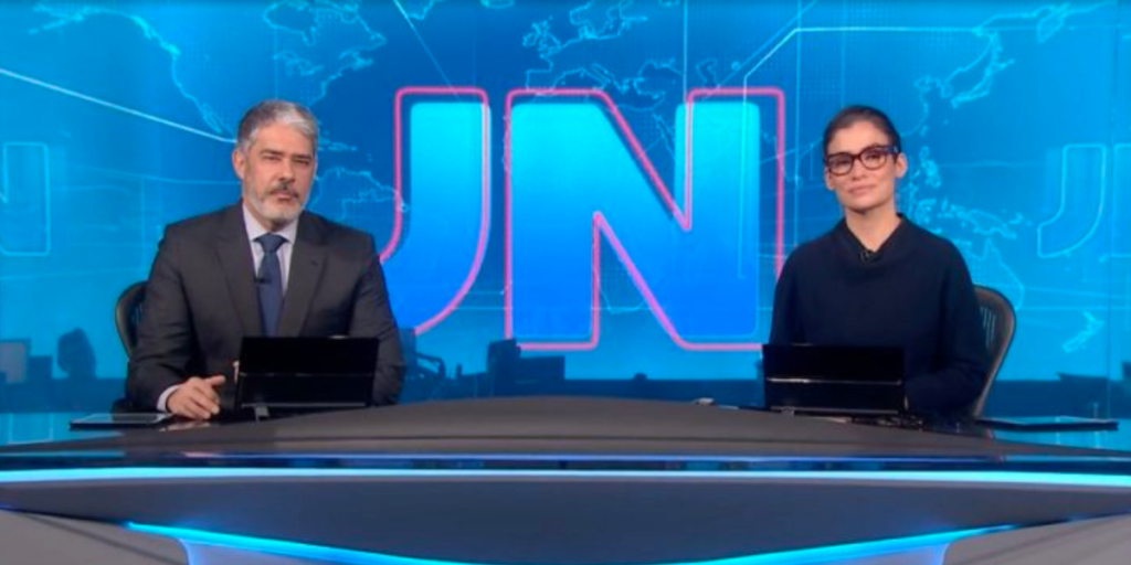 William Bonner e Renata Vasconcellos no Jornal Nacional (Foto: Reprodução) William Bonner e Renata Vasconcellos no Jornal Nacional (Foto: Reprodução)