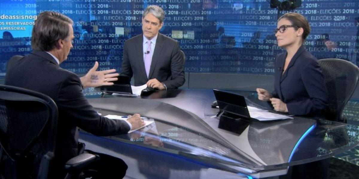 William Bonner e Renata Vasconcellos entrevistaram Bolsonaro em 2018 (Foto: Reprodução/TV Globo) William Bonner e Renata Vasconcellos entrevistaram Bolsonaro em 2018 (Foto: Reprodução/TV Globo)