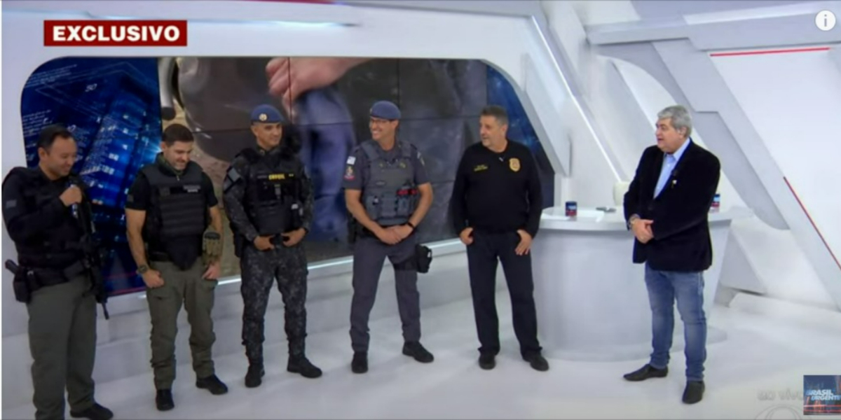 Datena falou com a Polícia Militar ao vivo (Foto: Reprodução/Band) Datena falou com a Polícia Militar ao vivo (Foto: Reprodução/Band)