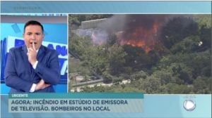 Gottino parou o Balanço Geral para noticiar um incêndio nos estúdios da Globo no Rio- Foto: Reprodução/Record