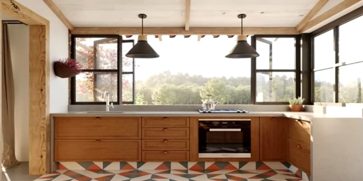 Cozinha funcional com vista para o lago cheio de peixes(Reprodução: Youtube)