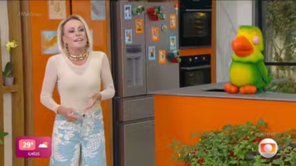 Apresentadora ao lado do Louro Mané (Foto: Reprodução/ Globo)