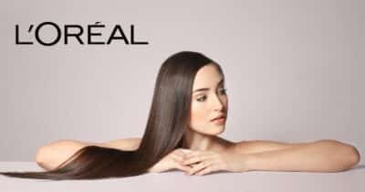 Logo da L'Oréal e mulher com o cabelo liso (Fotos: Reproduções / Internet / Canva)