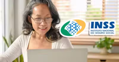 Mulher no notebook - Logo do INSS (Foto: Reprodução)