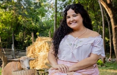 Maria Divina (Castorine) em Êta Mundo Melhor! (Foto: Reprodução / Globo)
