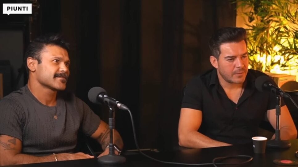 Marcos e Belutti comentaram proibição de regravações feita por Zezé em entrevista (Foto: Reprodução/ André Piunti/ YouTube)