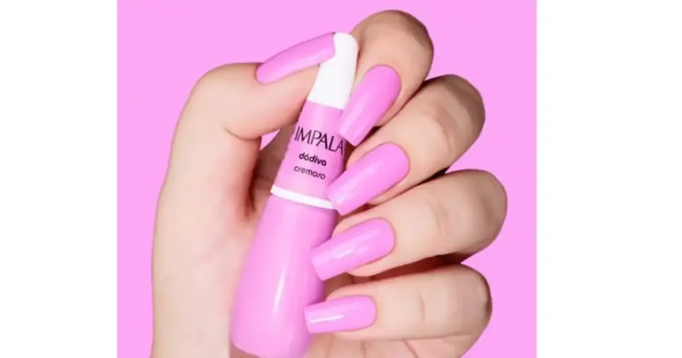 Unha com esmalte rosa Unha com esmalte rosa