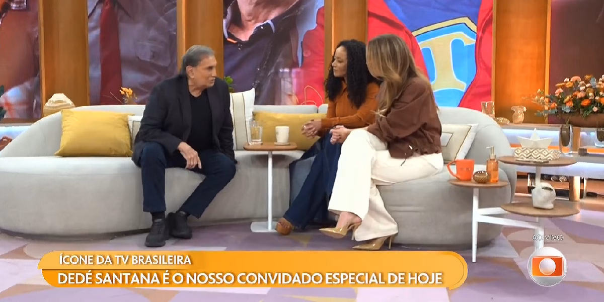 Dedé Santana ao lado das apresentadoras (Foto: Reprodução/ Globoplay) Dedé Santana ao lado das apresentadoras (Foto: Reprodução/ Globoplay)