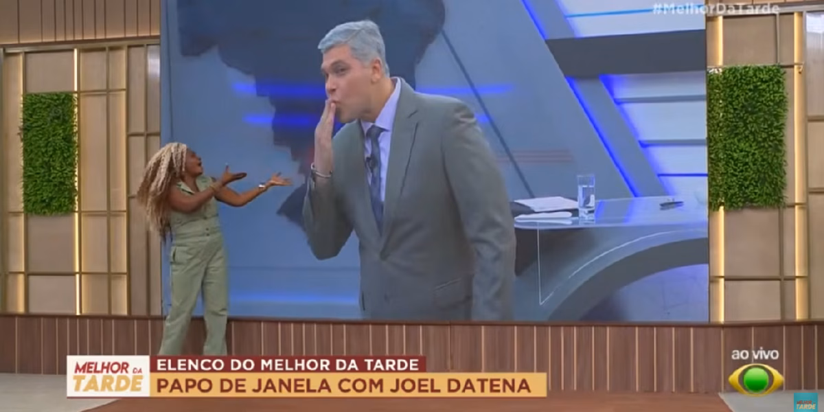 Joel Datena ao lado de Janaína Nunes (Foto: Reprodução/ YouTube/ Band/ Melhor da Tarde)