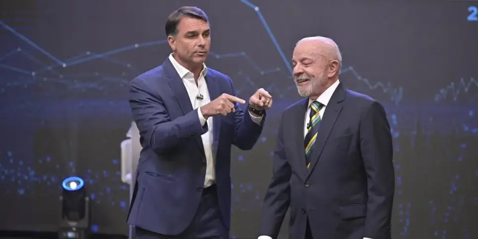 Flávio Bolsonaro e Lula durante Debate na Band (Foto: Reprodução/ Band) Flávio Bolsonaro e Lula durante Debate na Band (Foto: Reprodução/ Band)
