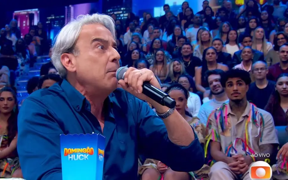 Alexandre Borges e MC Livinho de olhos arregalados. (Foto: Reprodução / Globo)